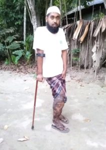 A man standing with Walking Stick